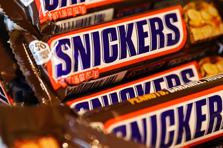 Making a Snickers bar is a complex science − a candy engineer explains how to build the airy nougat and chewy caramel of this Halloween favorite